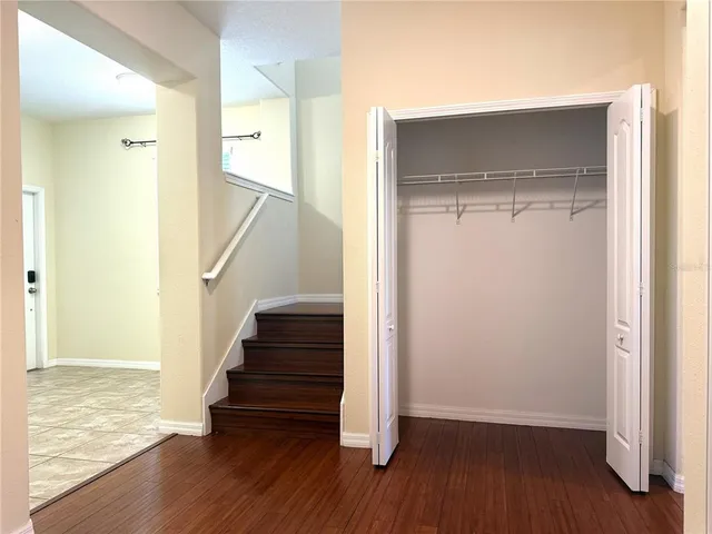 a view of entryway with wooden floor