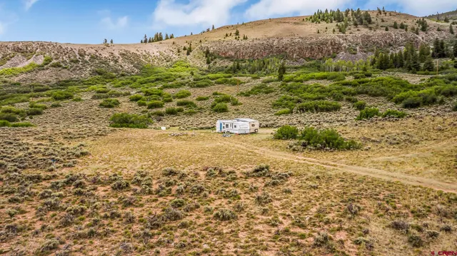 a view of a lake with a mountain in the background