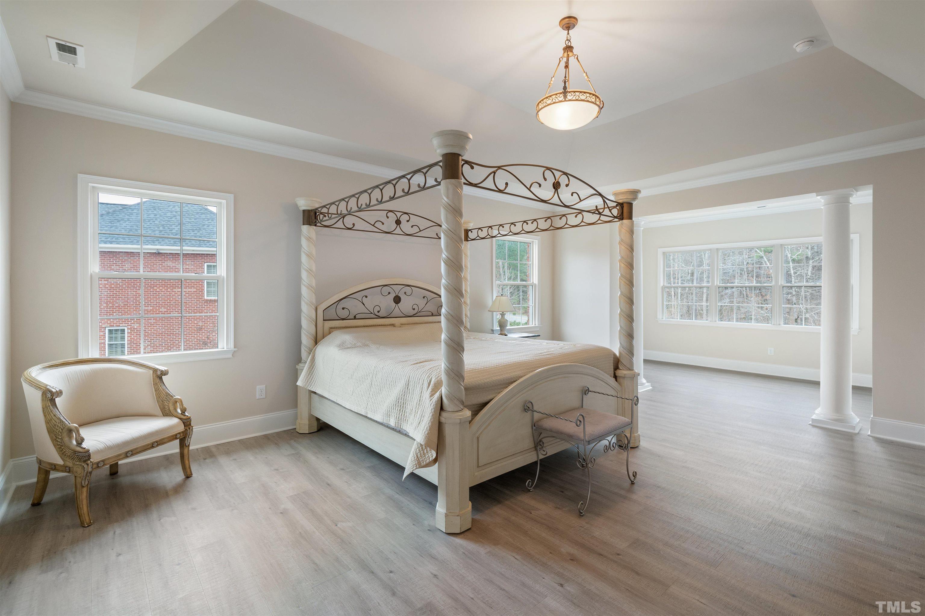 4109 Piney Gap Drive Cary, NC 27519 - Photo 23 of 39 a bedroom with a bed and window