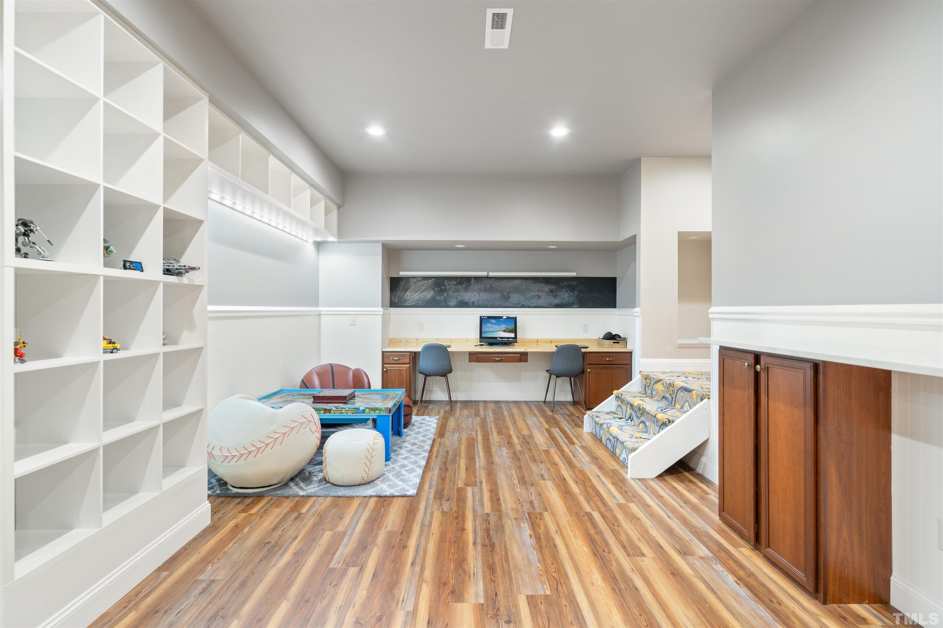 4109 Piney Gap Drive Cary, NC 27519 - Photo 27 of 39 a living room with furniture and a fireplace