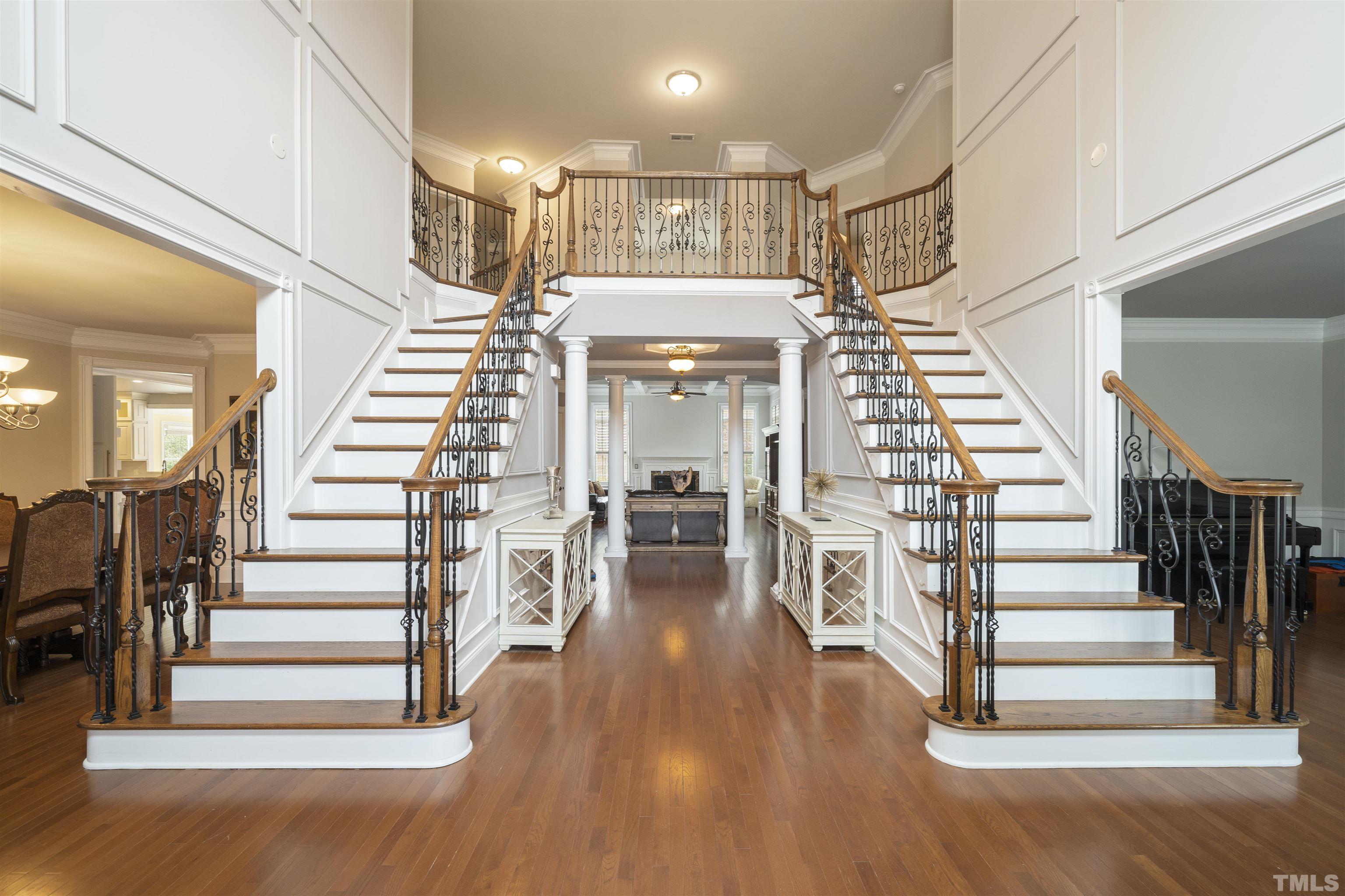 4109 Piney Gap Drive Cary, NC 27519 - Photo 4 of 39 a view of entryway and hall with wooden floor