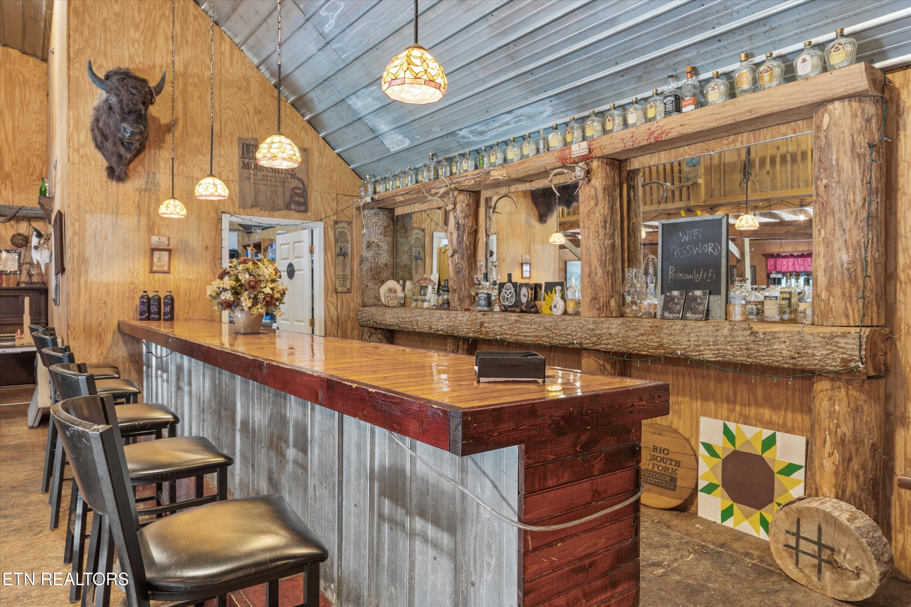 517 Adkins Trail Winfield, TN 37892 - Photo 4 of 53 saloon bar to full kitchen