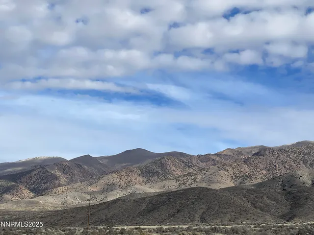 a view of mountains and mountain in back