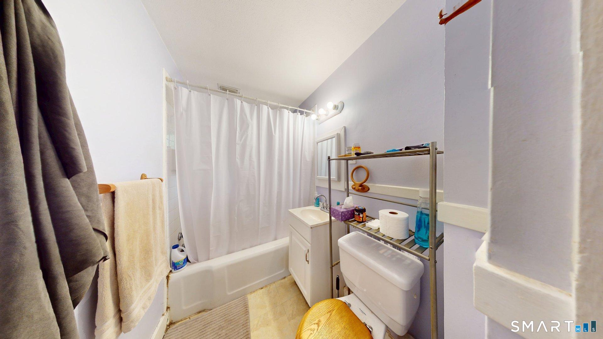 138 Main Street Somers, CT 06071 - Photo 18 of 40 a bathroom with a sink toilet and shower