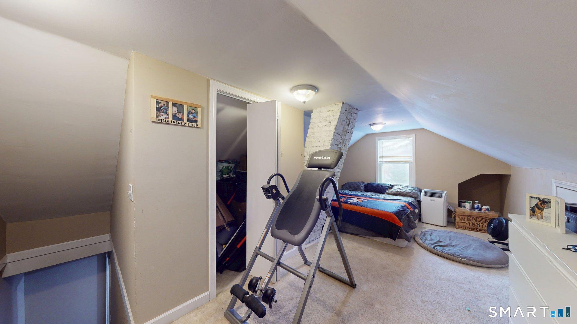 138 Main Street Somers, CT 06071 - Photo 25 of 40 a livingroom with furniture and a flat screen tv