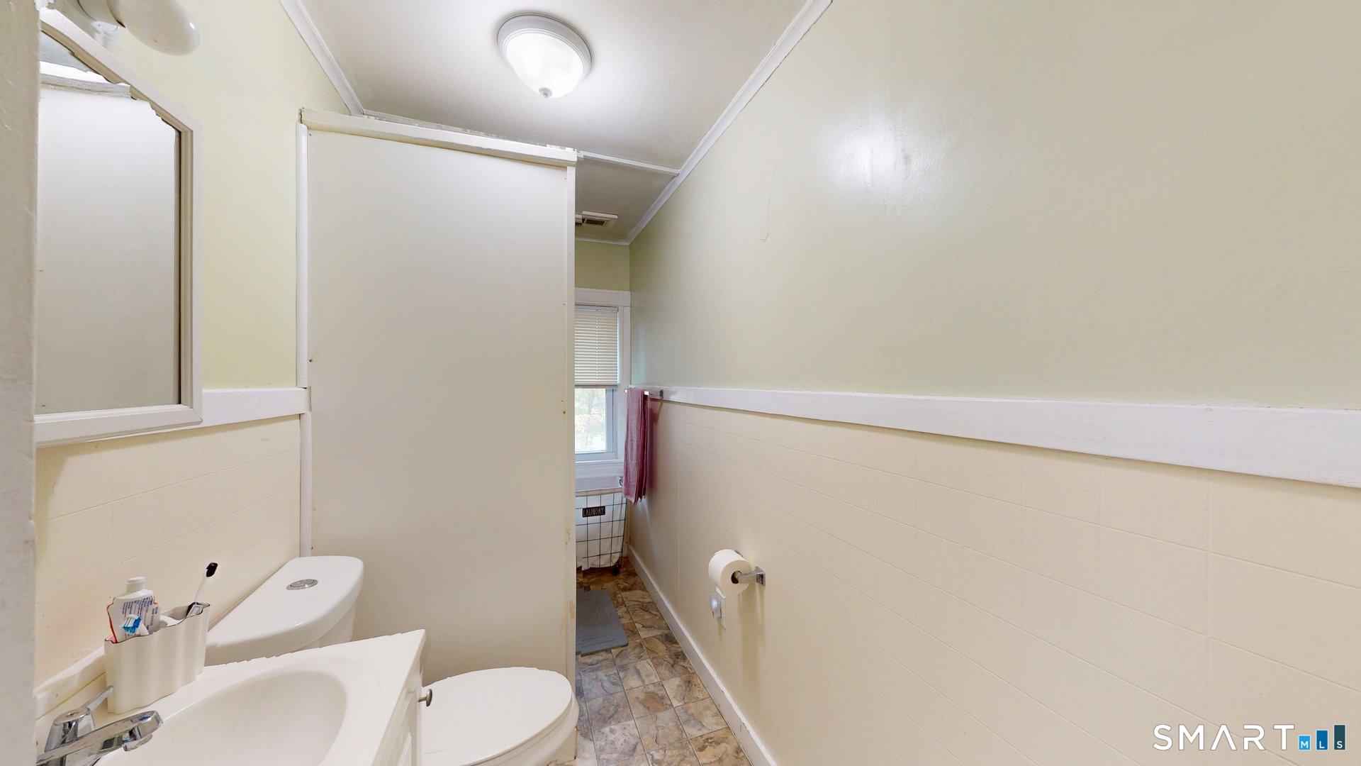 138 Main Street Somers, CT 06071 - Photo 26 of 40 a bathroom with a toilet and shower