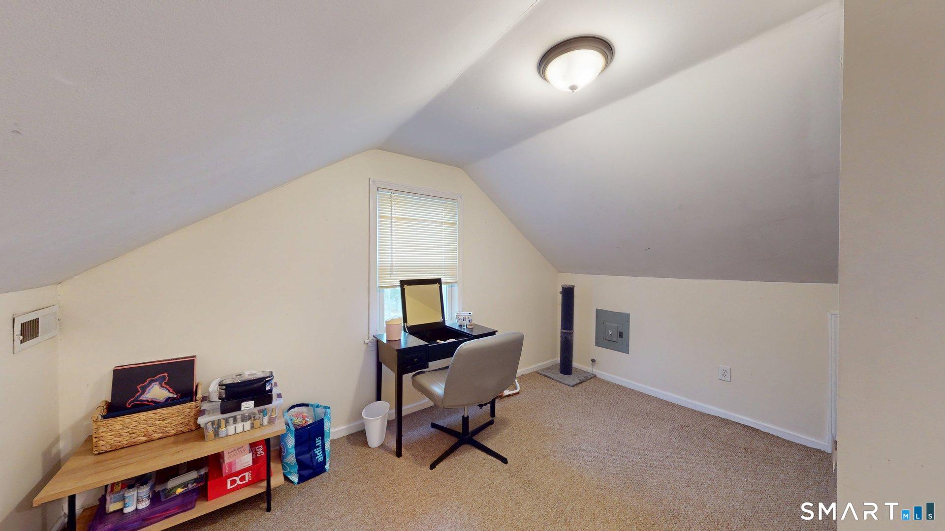 138 Main Street Somers, CT 06071 - Photo 34 of 40 a view of a workspace with furniture and a window