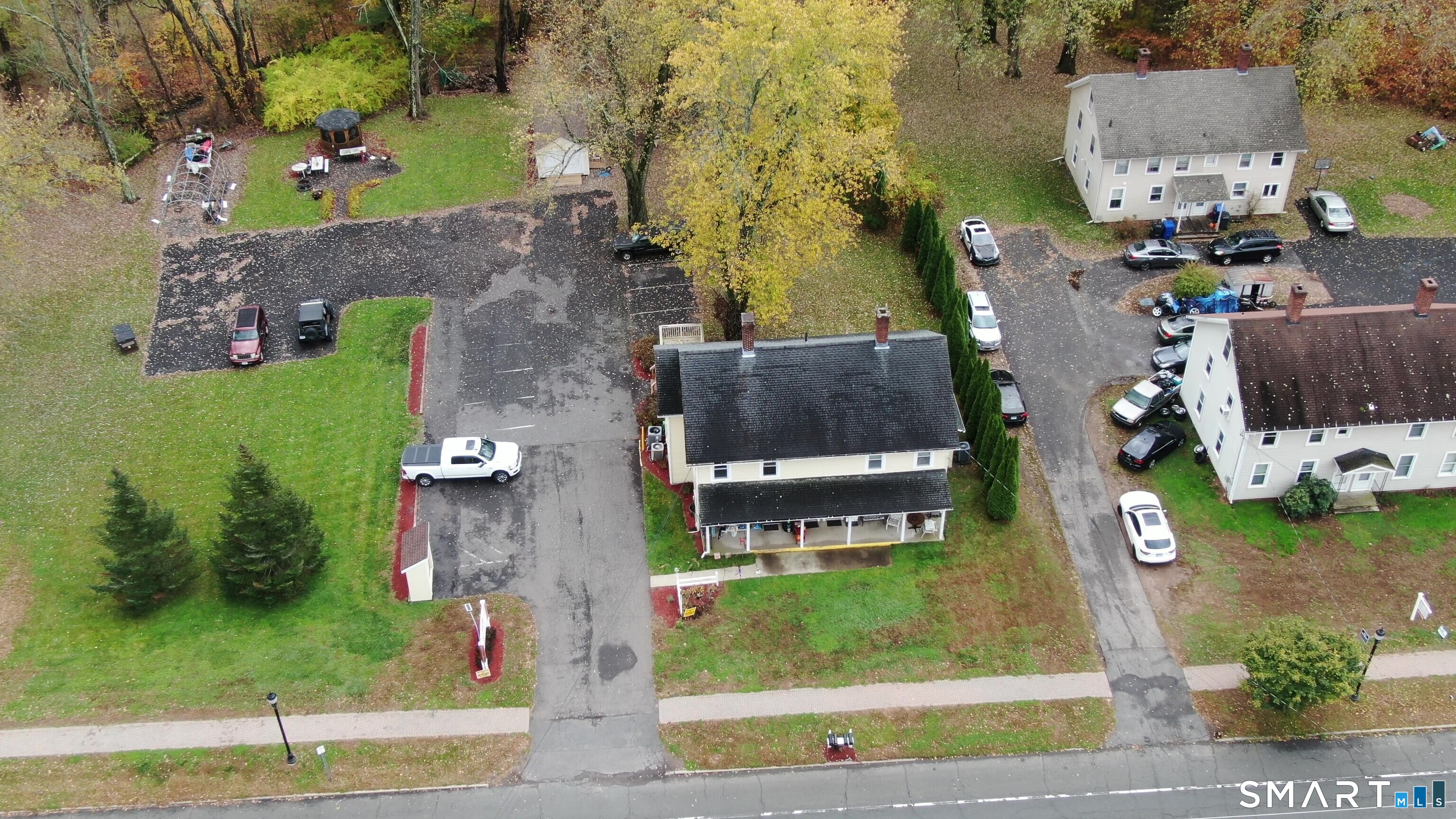 138 Main Street Somers, CT 06071 - Photo 7 of 40 an aerial view of a house with a garden