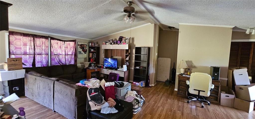 944 Lite-N-Tie Road Macon, GA 31211 - Photo 11 of 36 a living room with furniture and a flat screen tv