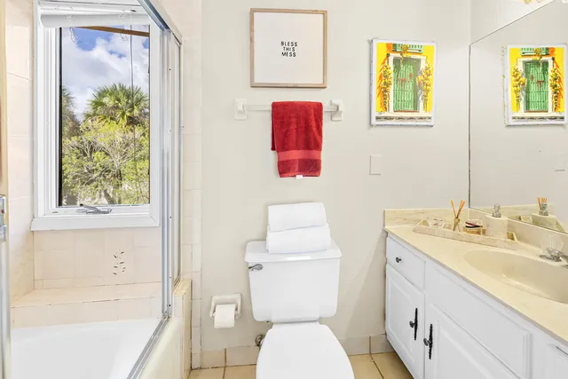 a bathroom with a toilet a sink and a bathtub