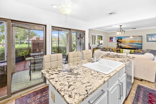 a living room with large windows