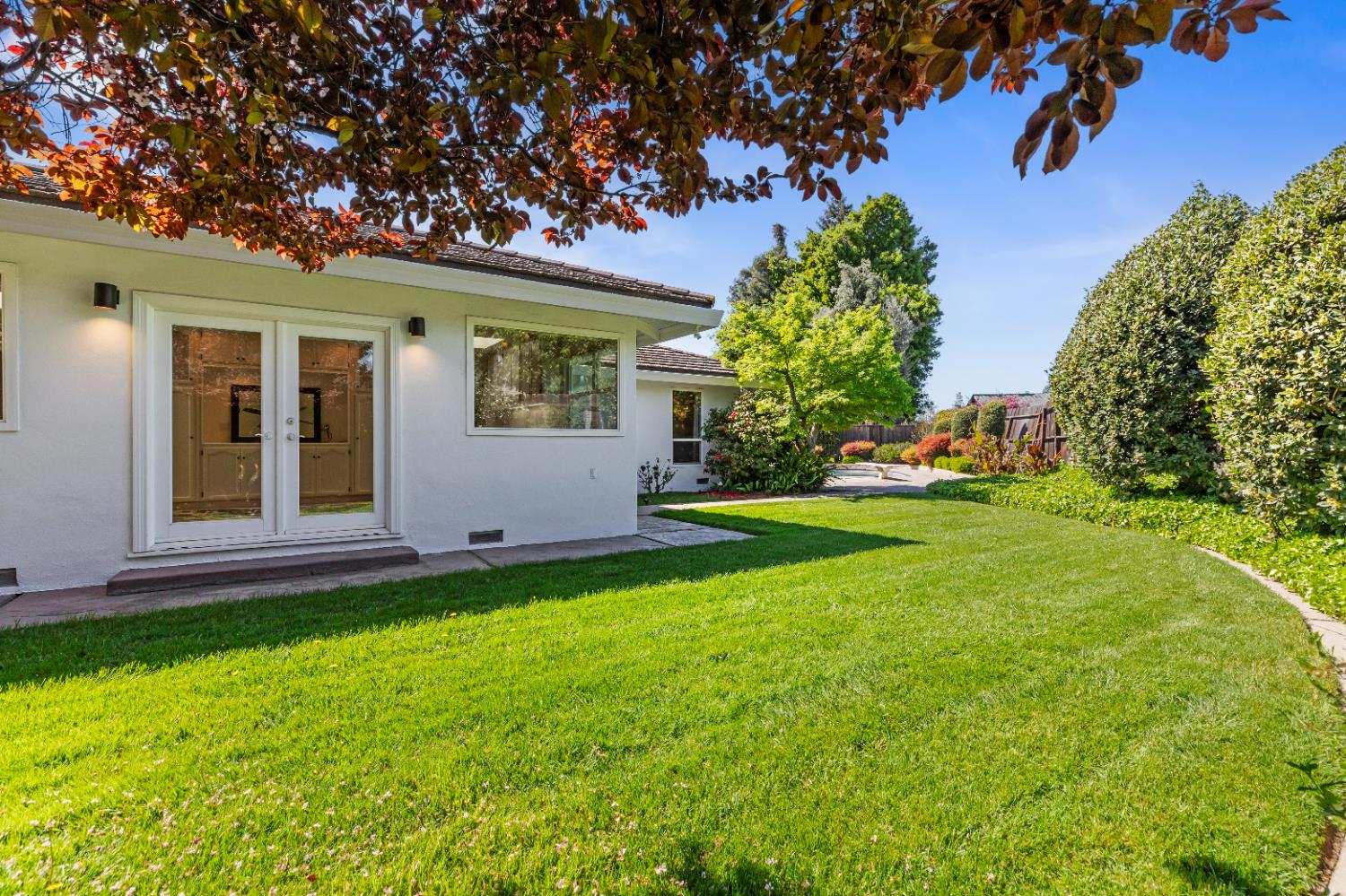 908 Newcastle Court Modesto, CA 95355 - Photo 19 of 25 a front view of a house with garden