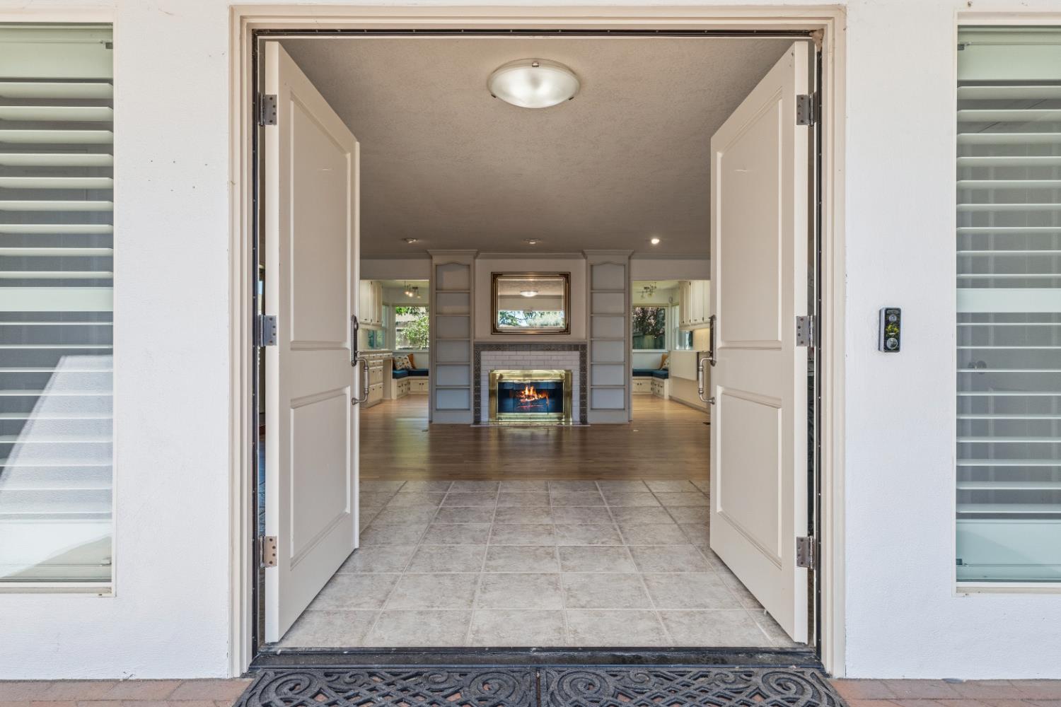 908 Newcastle Court Modesto, CA 95355 - Photo 3 of 25 a view of a hallway view with living room and dining room