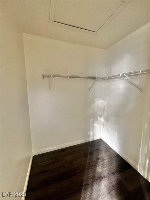 6656 Goldencreek Way, Unit HOME Las Vegas, NV 89108 - Photo 15 of 22 Spacious closet featuring dark wood finished floors