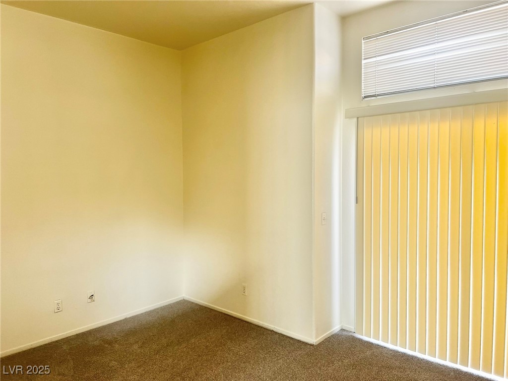 6656 Goldencreek Way, Unit HOME Las Vegas, NV 89108 - Photo 10 of 22 Spare room featuring carpet floors and baseboards