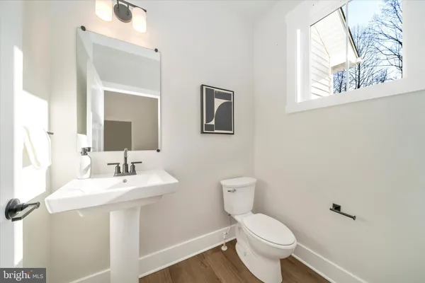 a bathroom with a shower and a toilet