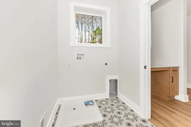 a bathroom with a tub shower and sink