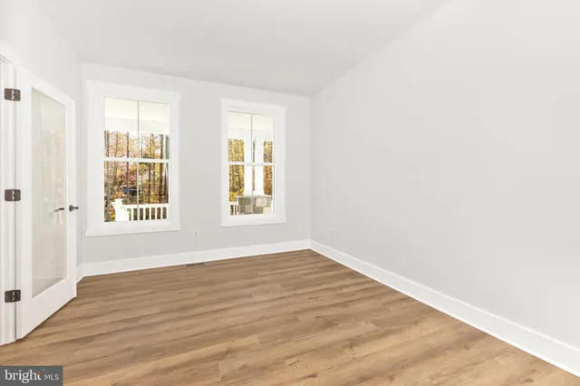 a bathroom with a shower and a toilet