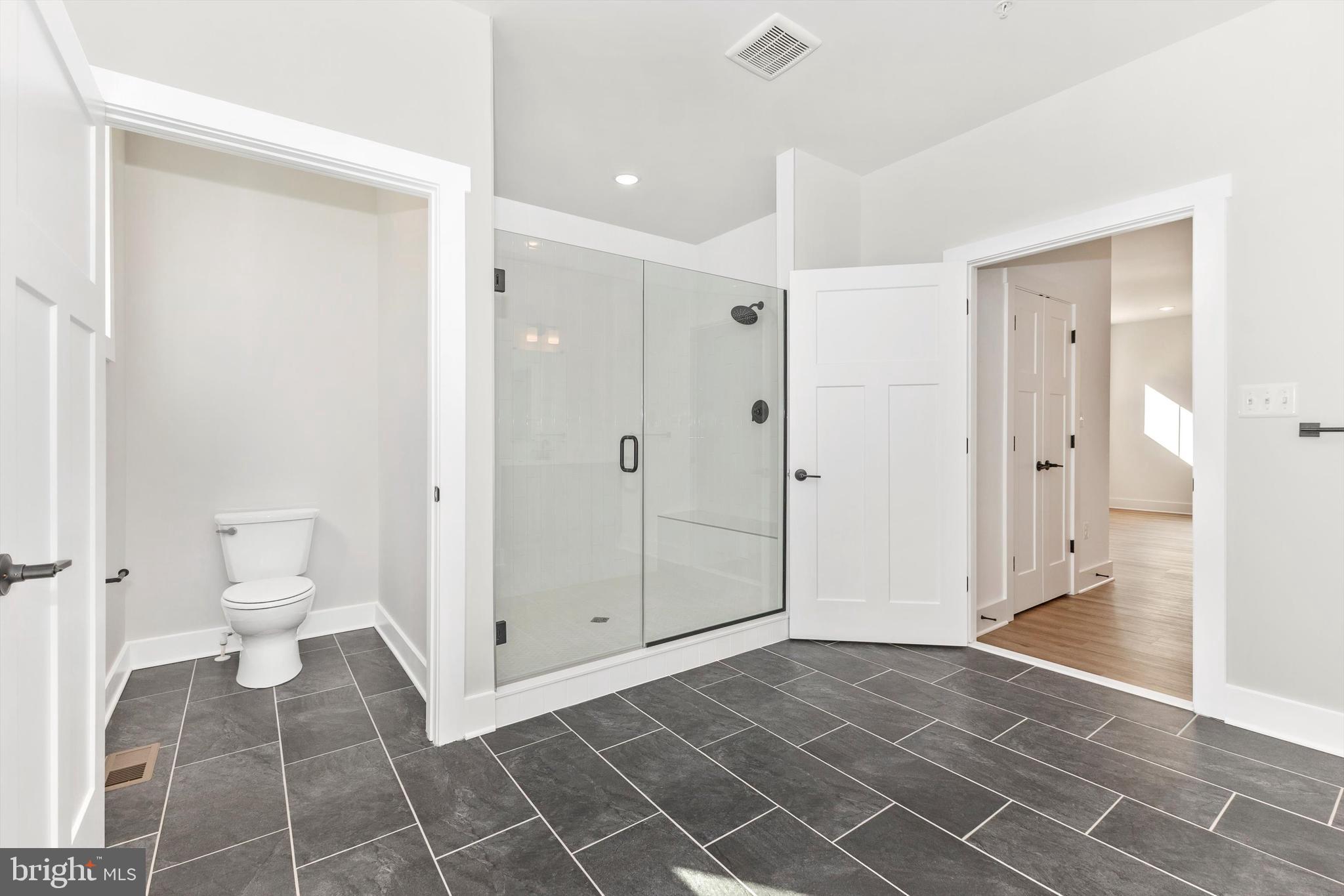 204 3 Rivers Road Harwood, MD 20776 - Photo 26 of 62 a bathroom with a shower and a toilet