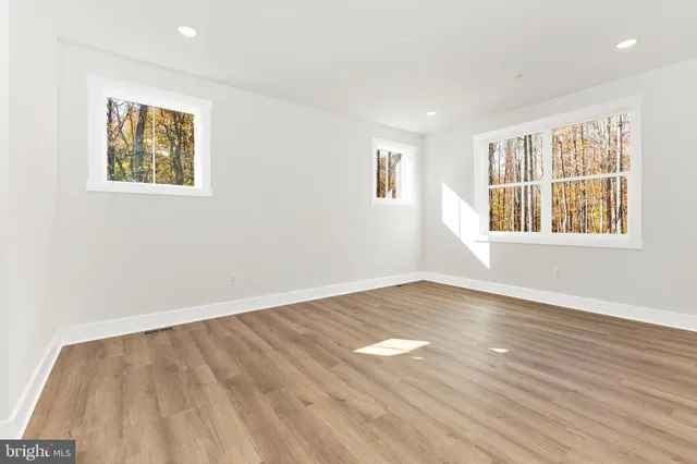 an empty room with windows