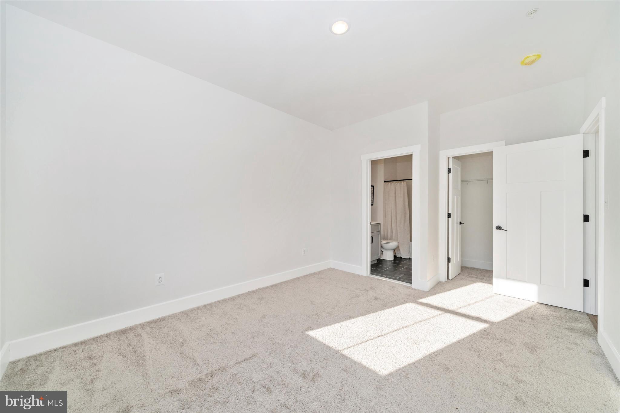 204 3 Rivers Road Harwood, MD 20776 - Photo 29 of 62 a view of a livingroom with wooden floor and cabinet