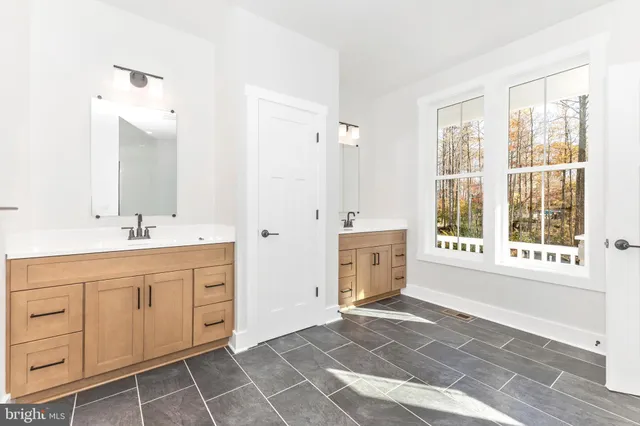 a bathroom with a sink a toilet and a bathtub
