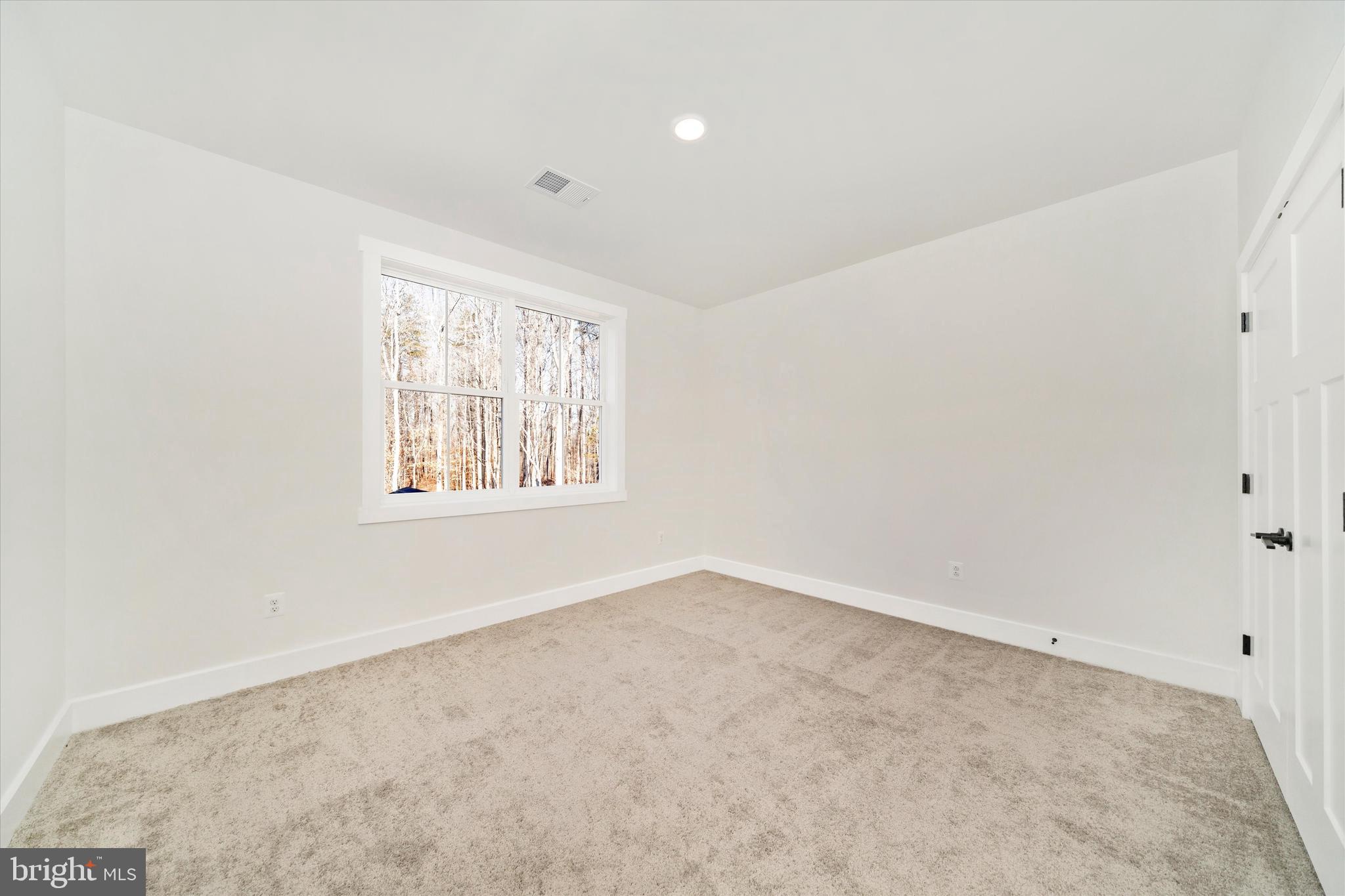 204 3 Rivers Road Harwood, MD 20776 - Photo 32 of 62 an empty room with windows