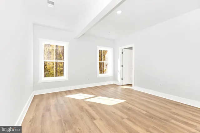 a front view of a house with swimming pool