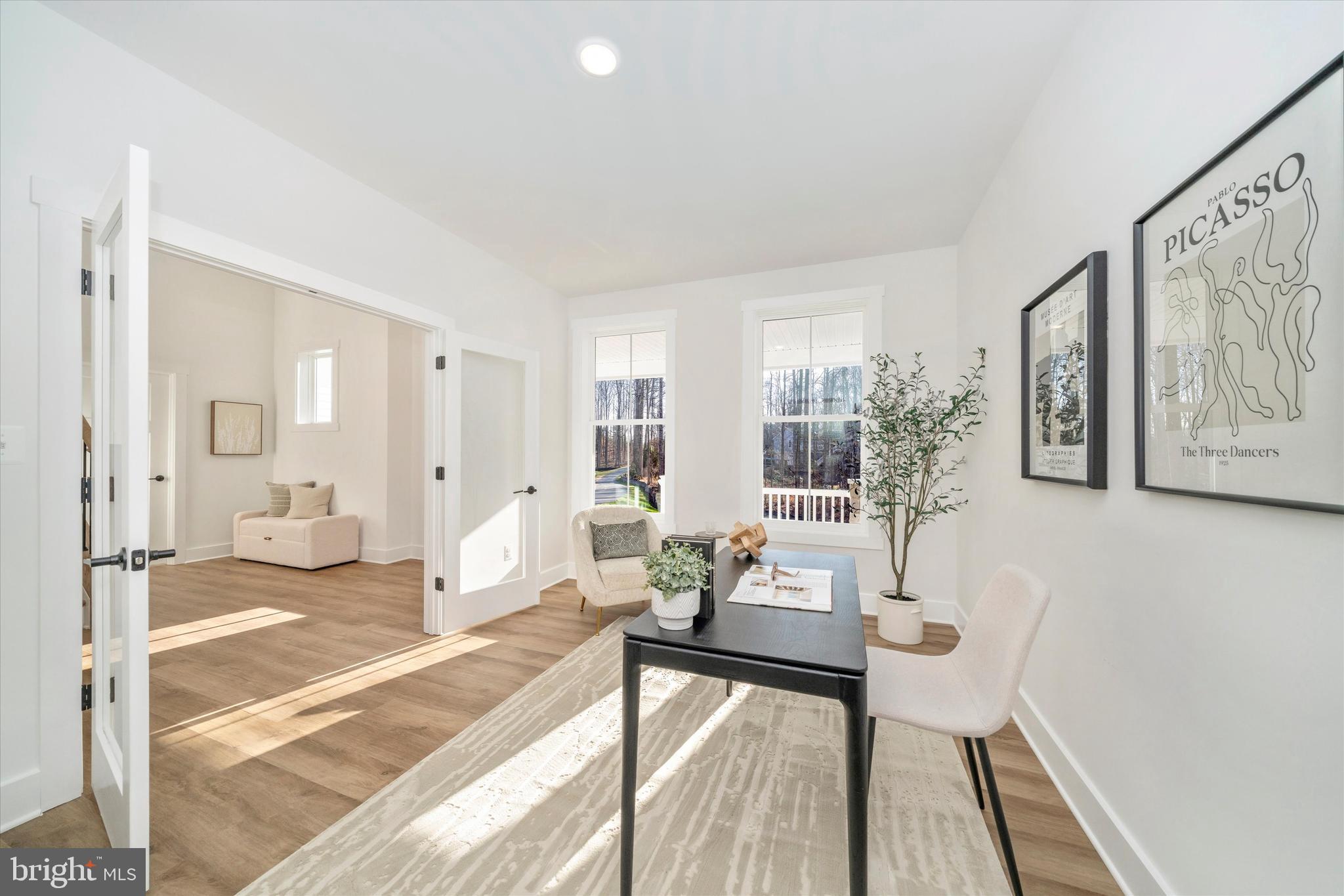 204 3 Rivers Road Harwood, MD 20776 - Photo 5 of 62 a living room with furniture and a table
