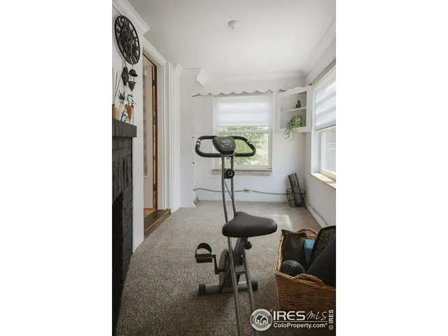 a view of livingroom with furniture and a window