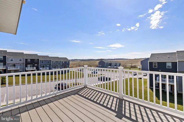 a view of a balcony with city view