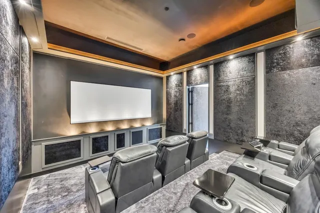 a bathroom with a sink a mirror and a shower