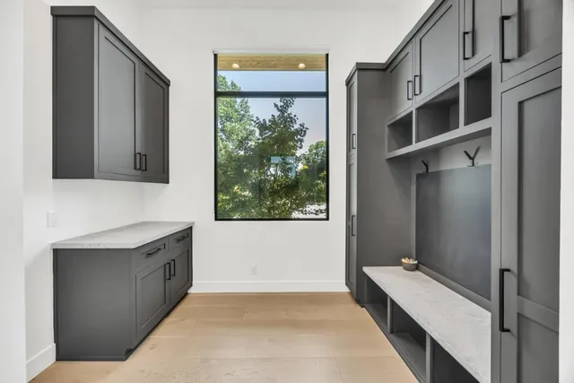 a workspace with furniture and a flat screen tv