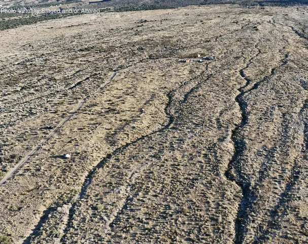 a sign that is on a brick wall