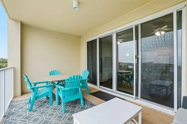 a room with a table and chairs