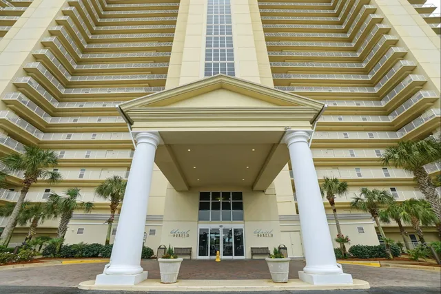 a view of a swimming pool with a terrace
