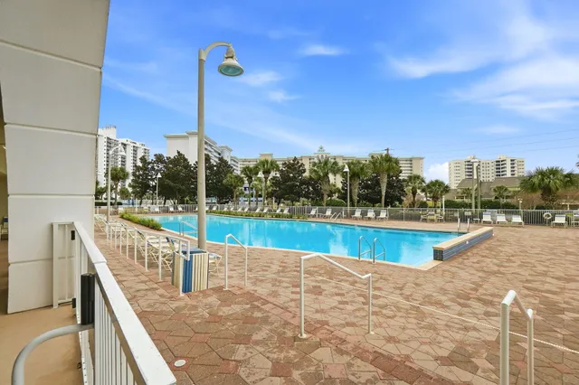 a view of a glass door and a living room