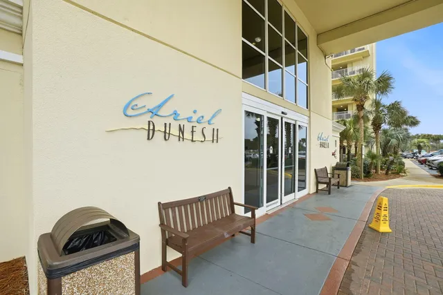 a front view of a building with glass windows