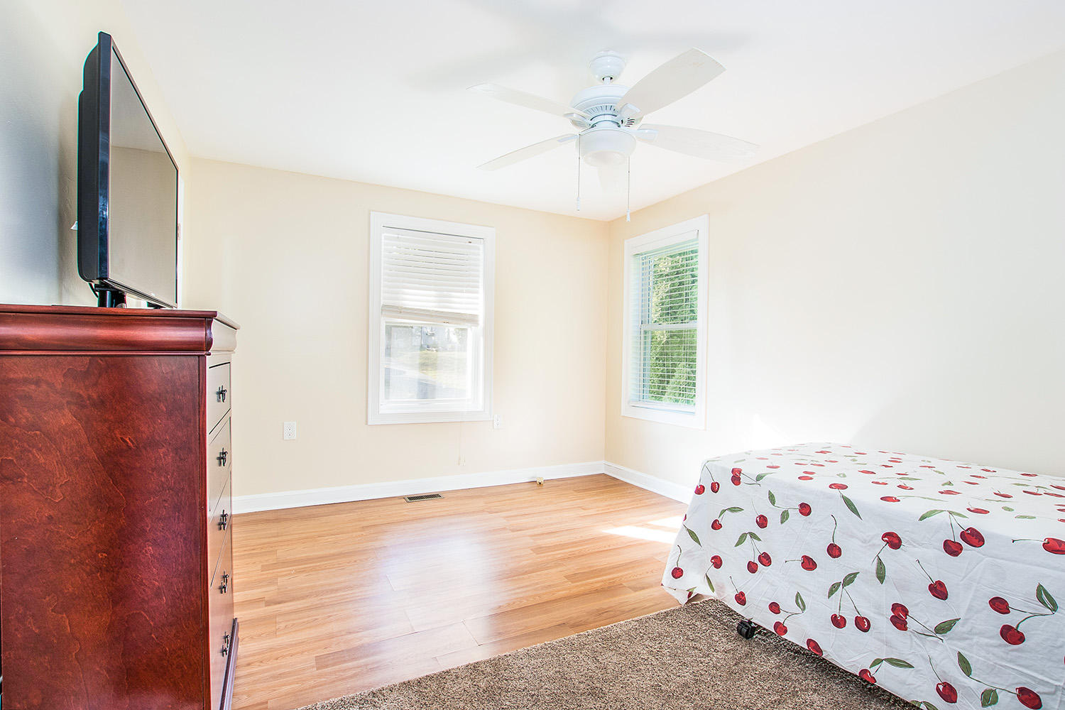 56 Daisy Hill Road Hyannis, MA 02601 - Photo 18 of 38 a bedroom with a bed and a flat screen tv
