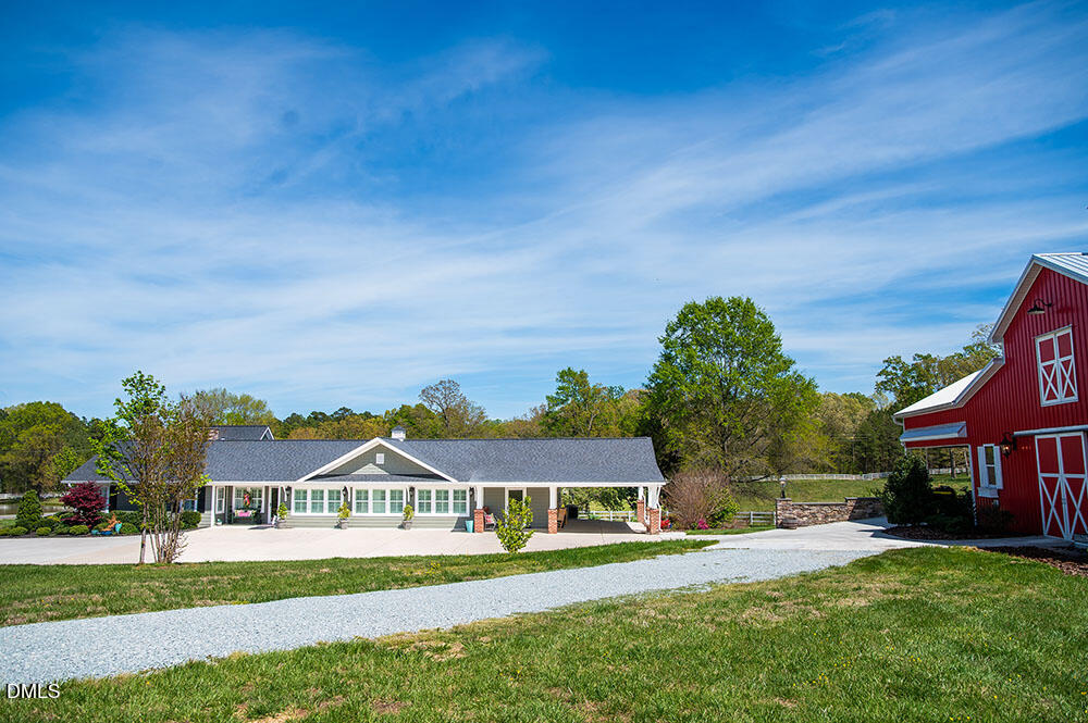 75 Frank Timberlake Road Timberlake, NC 27583 - Photo 73 of 93 a front view of a house with a yard