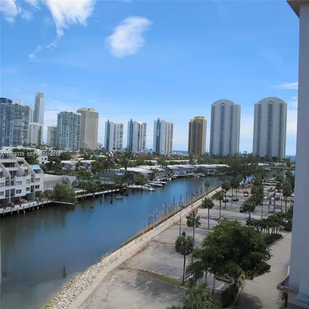 a view of a city with tall buildings