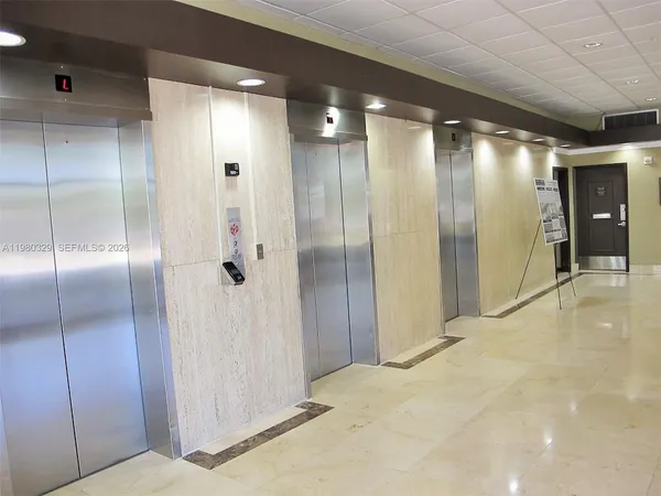 an aerial view of a city with lake view