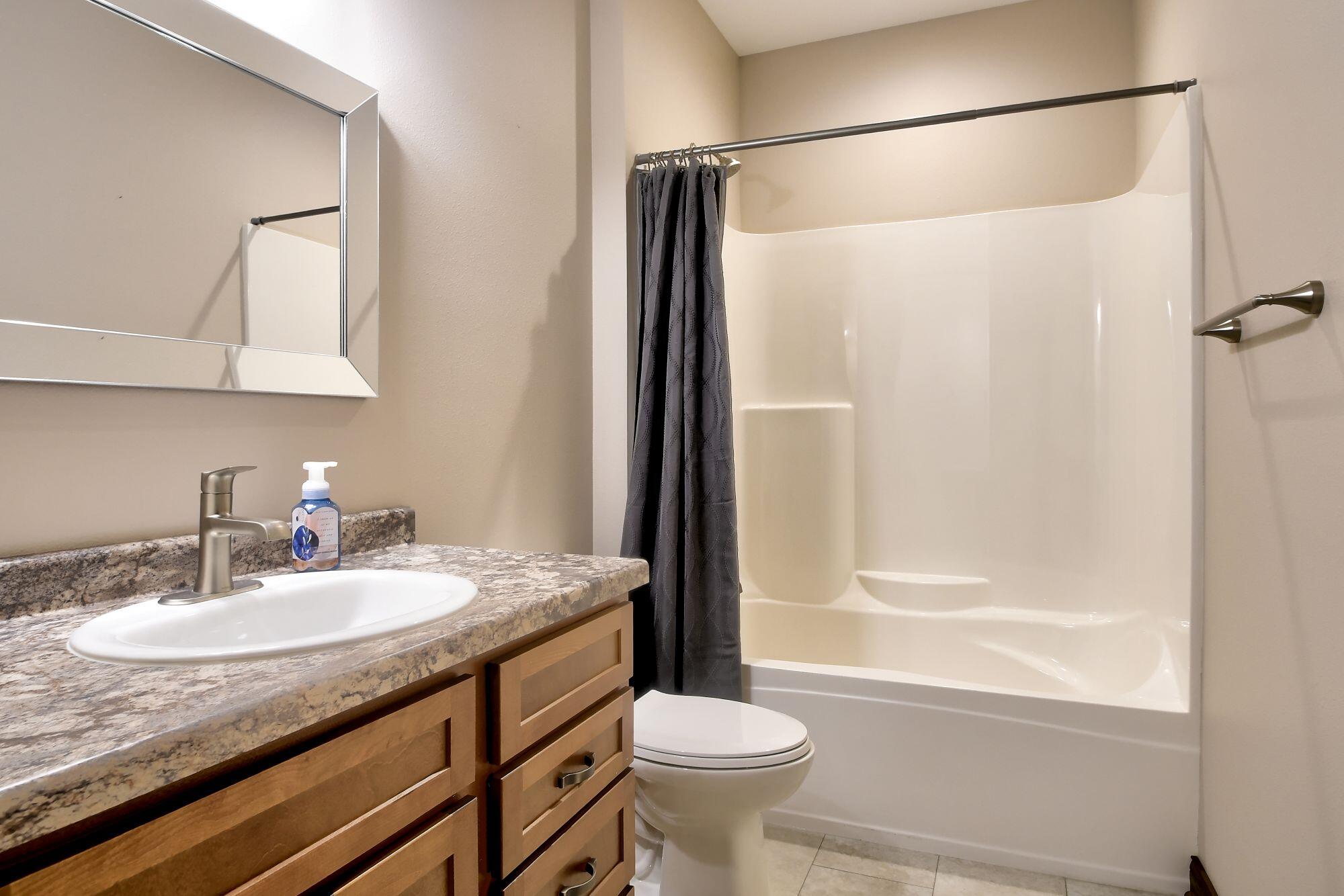 1791 Edgewood Road, Unit 11 Kewaskum, WI 53040 - Photo 13 of 16 super sized tub with shower