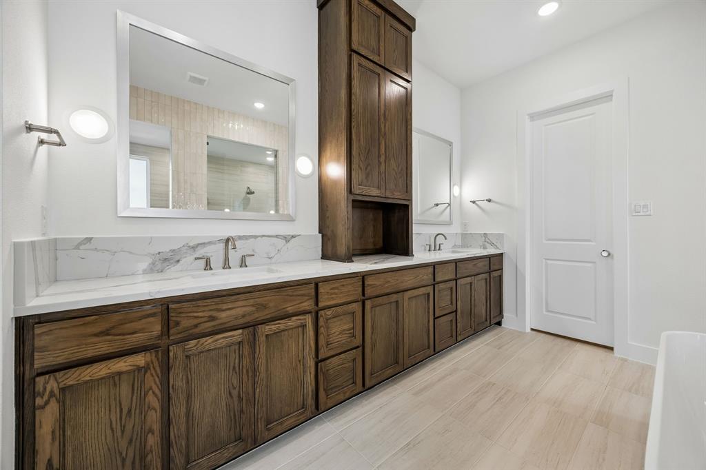 2404 Cairn Road McKinney, TX 75071 - Photo 9 of 18 Plenty of space for two in this over the top owner's bath!