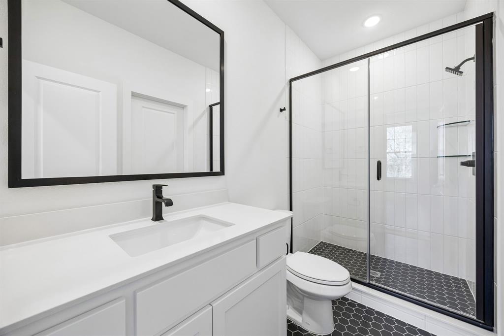 2404 Cairn Road McKinney, TX 75071 - Photo 18 of 18 Guests will feel right at home in any of the beautiful secondary baths you'll find in our Madison II floor plan.