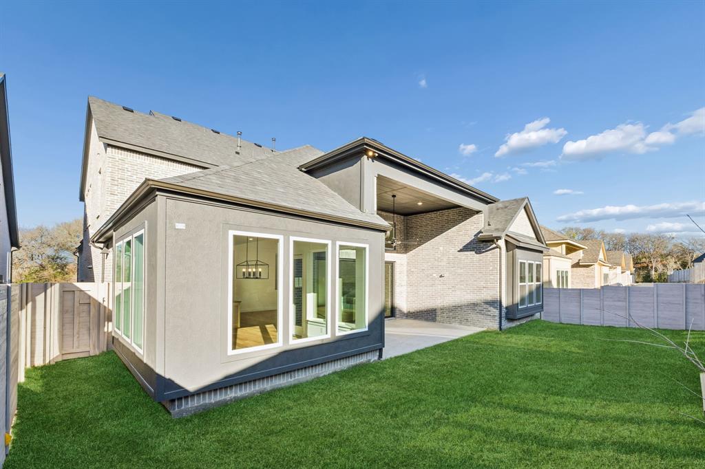 2404 Cairn Road McKinney, TX 75071 - Photo 11 of 18 With an oversized covered back patio and private fenced yard, the entire family will enjoy the great outdoors in this wonderful home!