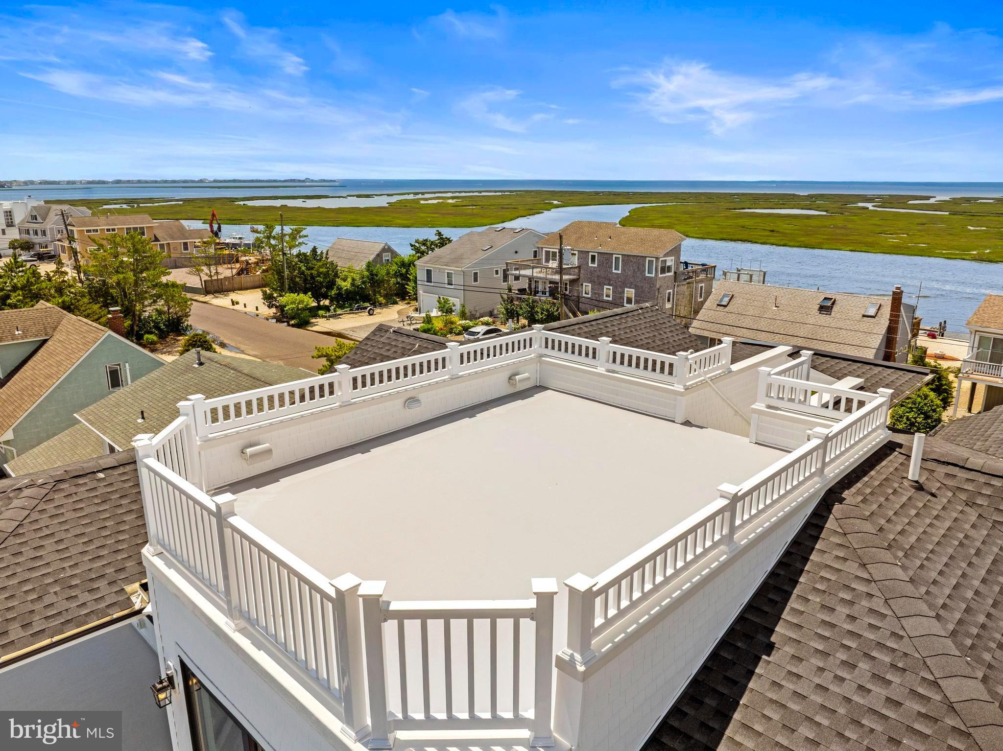 17 Butler Road Long Beach Township, NJ 08006 - Photo 104 of 110 a view of a city from a balcony