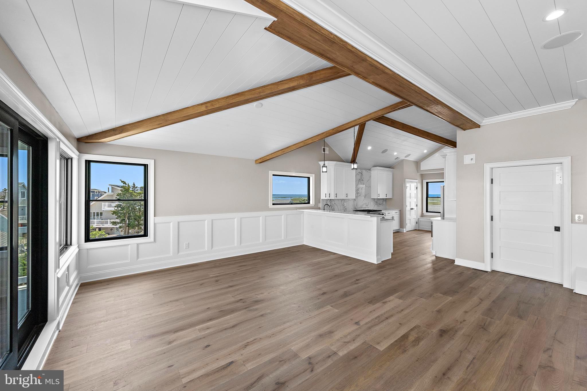 17 Butler Road Long Beach Township, NJ 08006 - Photo 18 of 110 a view of empty room with wooden floor and fan