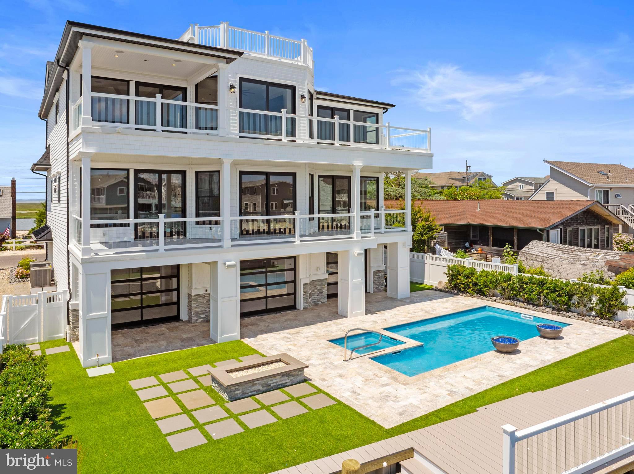 17 Butler Road Long Beach Township, NJ 08006 - Photo 3 of 110 a front view of a house with a yard
