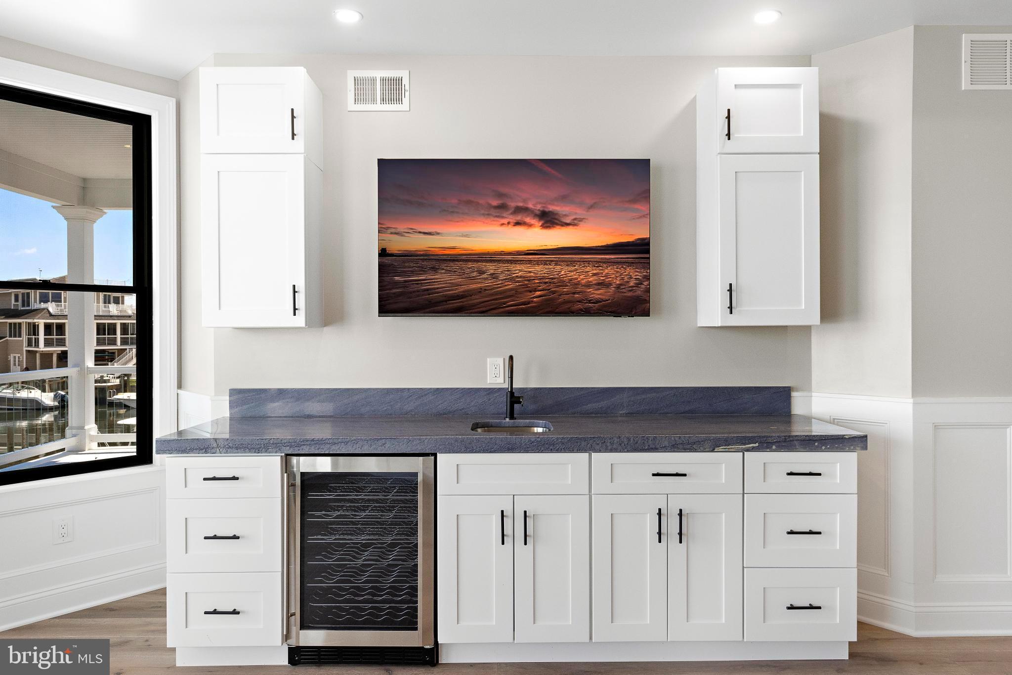 17 Butler Road Long Beach Township, NJ 08006 - Photo 38 of 110 a kitchen with stainless steel appliances a cabinets and a stove top oven